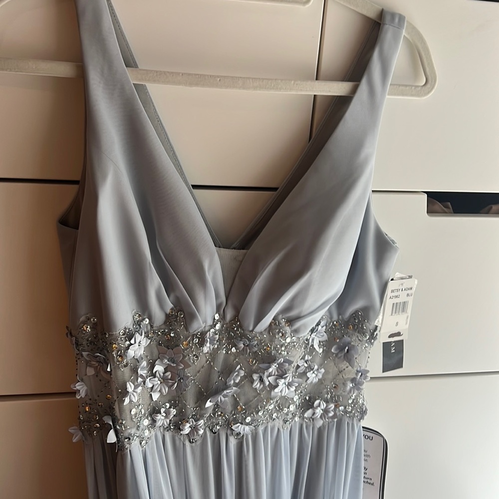 Evening dress. New with tags. Designer is Betsy & Adam size 8